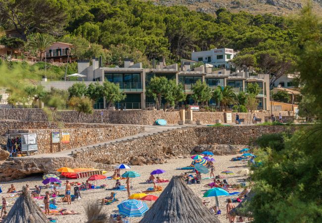 Апартаменты на Cala Sant Vicenç - Mirador Blue Garden F Апартаменты на Cala Sant Vicenç - Mirador Blue Garden F